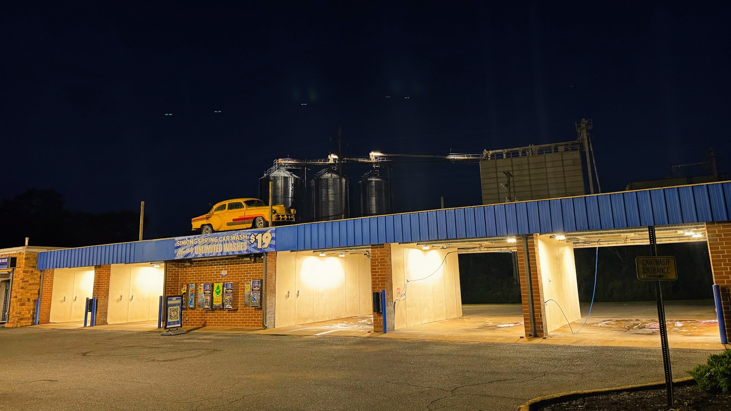 Sinking Spring Car Wash self-service bays lit up at night
